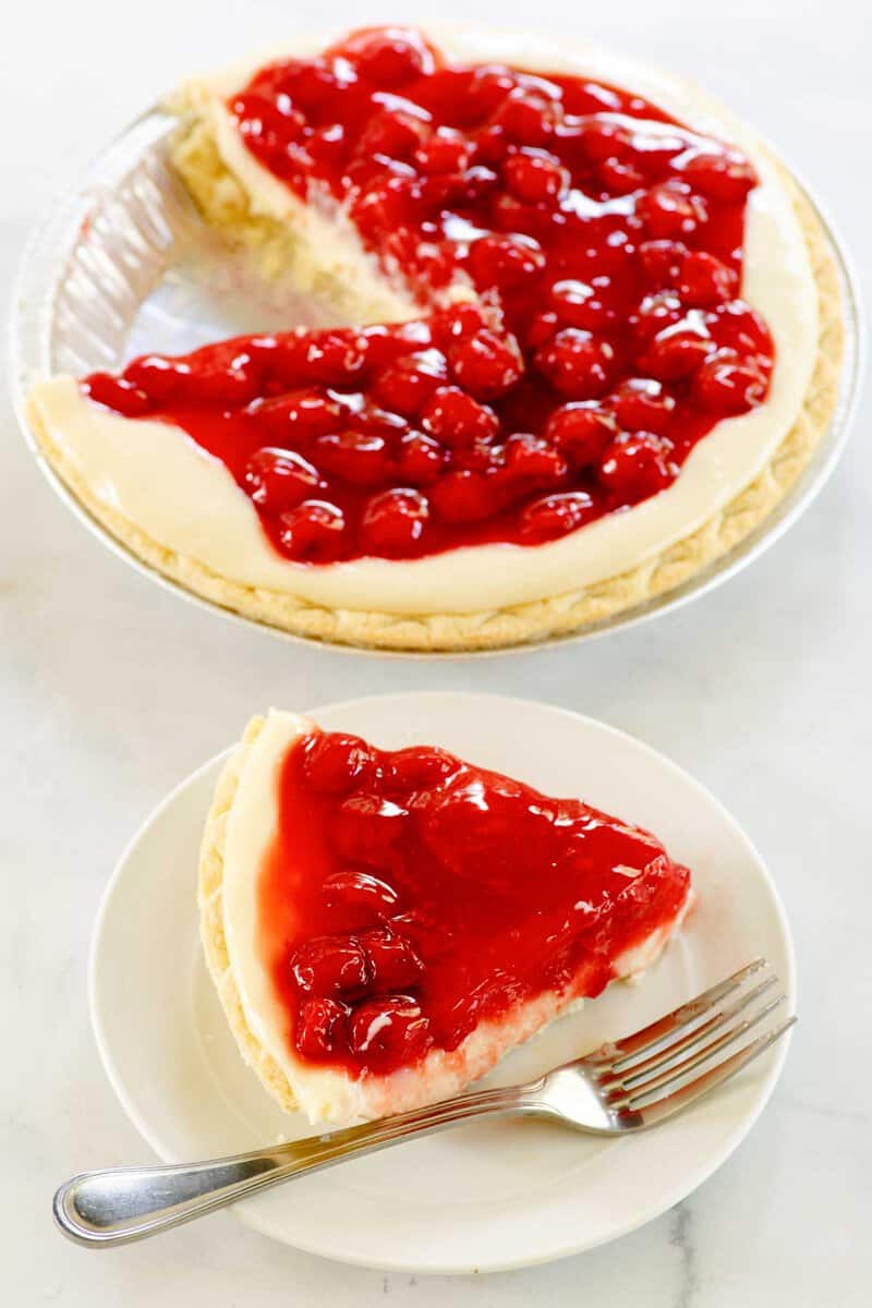 Cherry cream cheese pie and a slice on a plate.