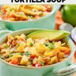Homemade El Torito's chicken tortilla soup in soup crocks.