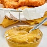 Homemade McDonald's hot mustard dipping sauce in a small bowl.