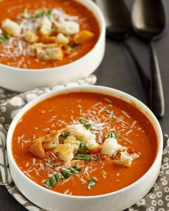 Two bowls of copycat Panera tomato soup.