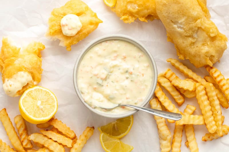 Copycat Red Lobster tartar sauce in a bowl, fried fish, and French fries.
