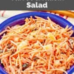 Homemade Chick Fil A carrot raisin salad in a small serving bowl.