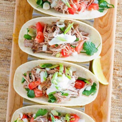 Copycat Chipotle carnitas in tacos.