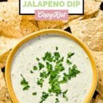 Homemade Chuy's creamy jalapeno ranch dip and tortilla chips on a platter.