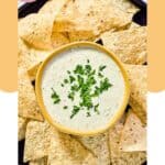 Tortilla chips and a bowl of homemade Chuy's creamy jalapeno dip.