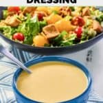 A bowl of homemade Outback honey mustard dressing and a salad.