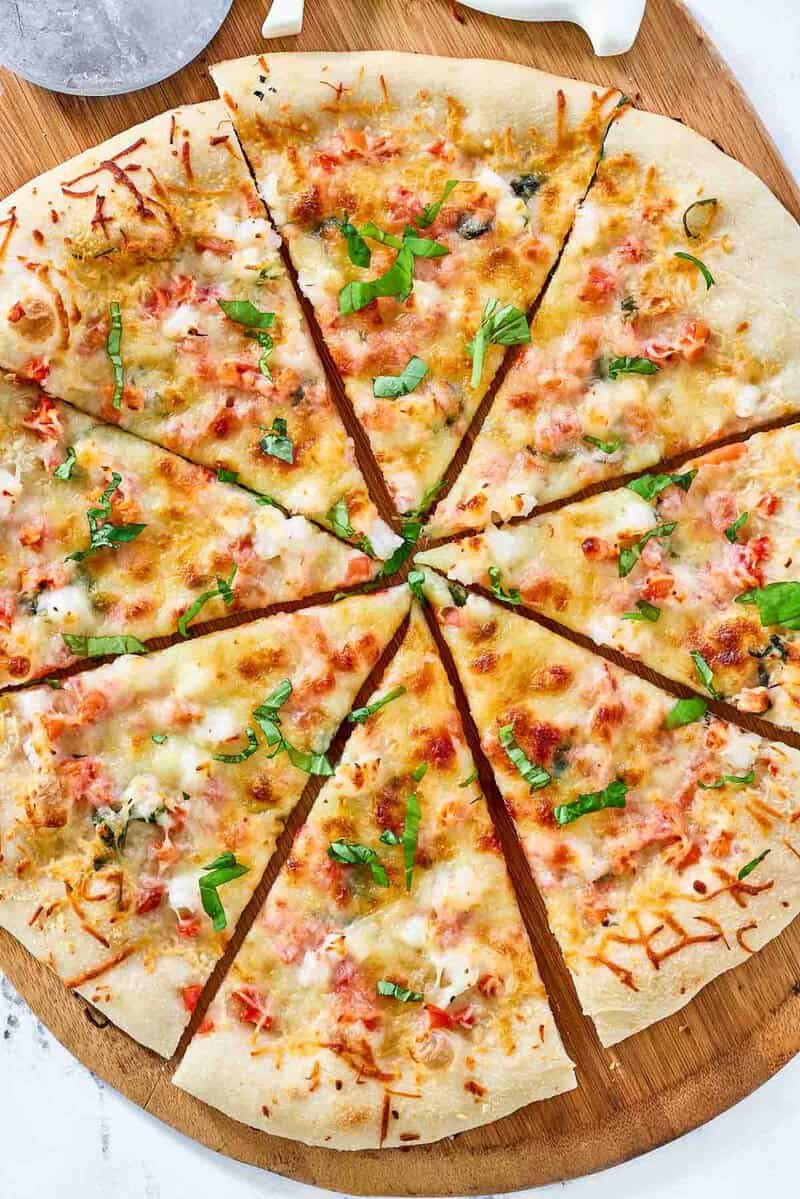 Copycat Red Lobster lobster pizza on a pizza peel.