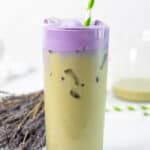 Copycat Starbucks iced lavender cream oatmilk matcha in a glass with a straw.