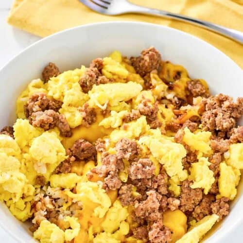 Copycat Waffle House sausage, egg, and cheese hashbrown bowl.