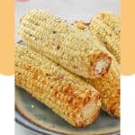 Air fried corn on the cob on a plate.