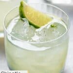 Homemade Chipotle margarita garnished with a lime wedge.