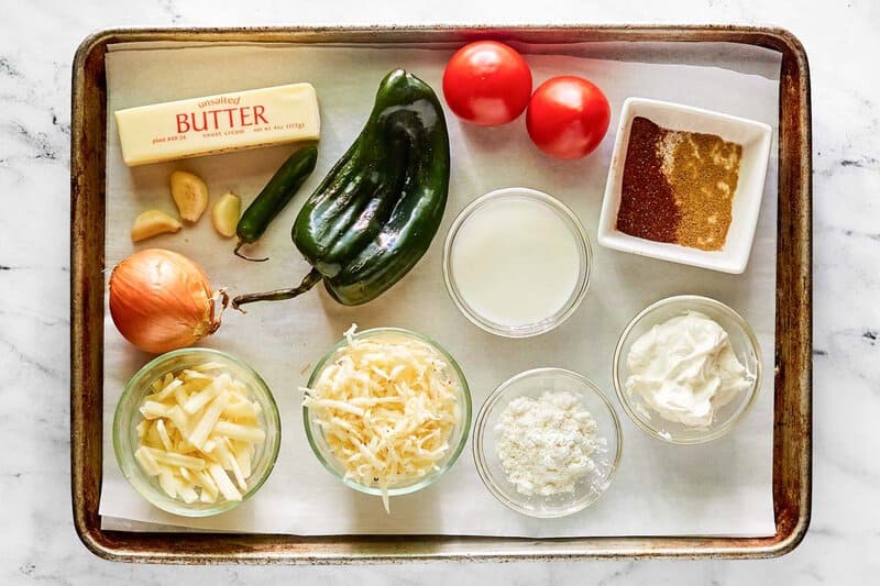 Copycat Chipotle queso blanco ingredients on a tray.