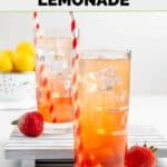 Two glasses of homemade Sonic strawberry lemonade, lemons, and strawberries.