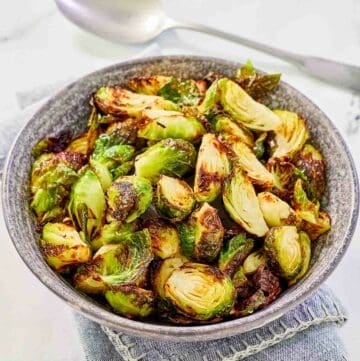 Air fryer Brussels sprouts in a bowl.
