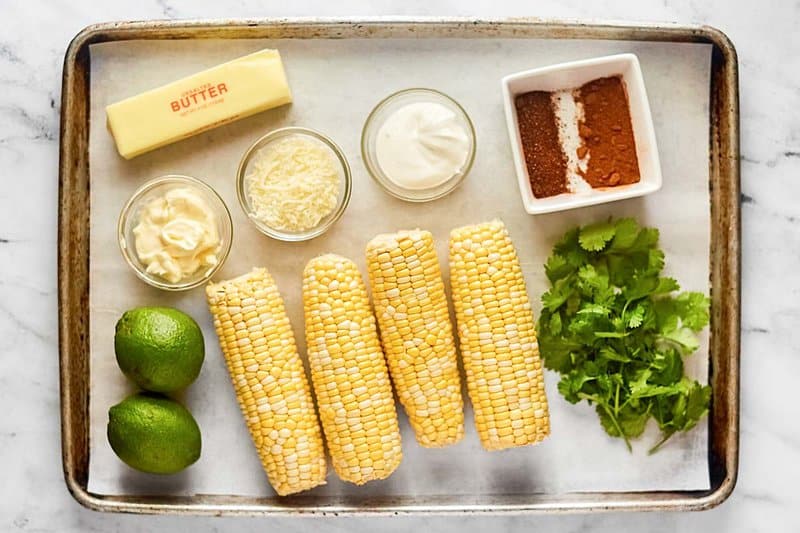 Copycat Chili's roasted street corn ingredients on a tray.