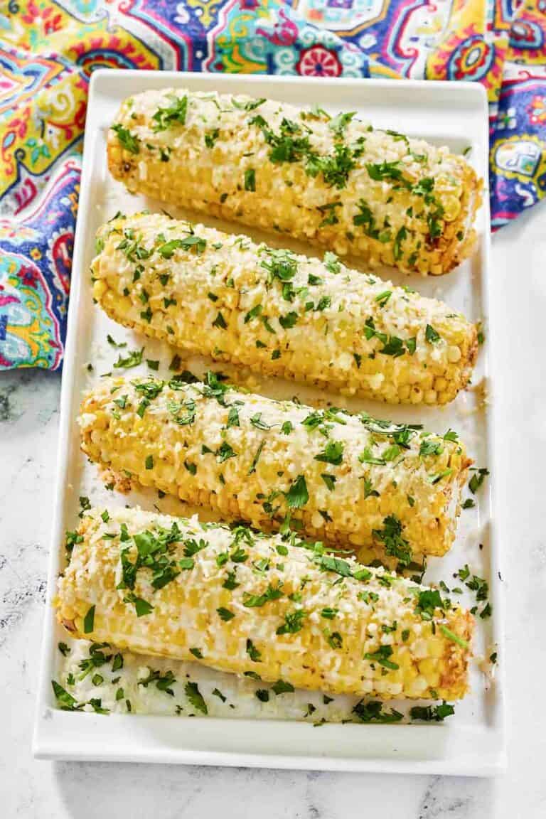 Copycat Chili's roasted street corn on a platter.