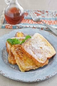 Copycat Denny's French toast, syrup, and a fork.