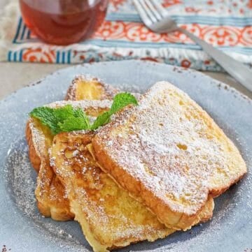 Copycat Denny's French toast, syrup, and a fork.