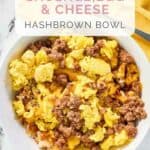 A copycat Waffle House hash brown bowl with sausage.