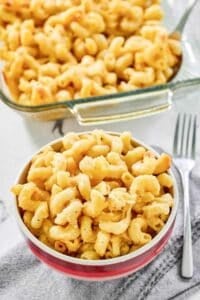 Copycat Costco mac and cheese in a bowl and baking dish.