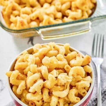 Copycat Costco mac and cheese in a bowl and baking dish.