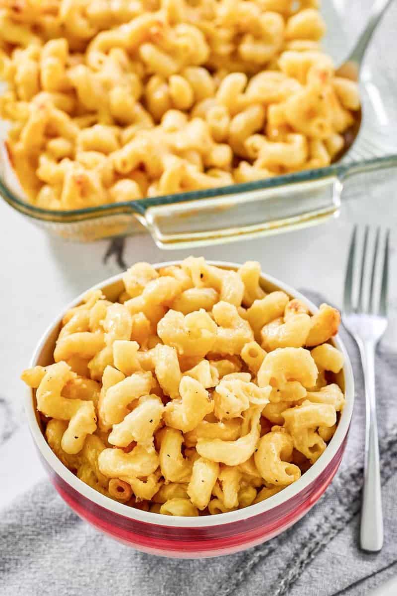 Copycat Costco mac and cheese in a bowl and baking dish.