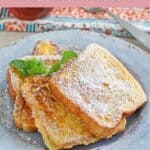 Slices of homemade Denny's French toast on a plate.