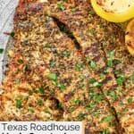 Homemade Texas Roadhouse herb crusted chicken breasts and lemons.