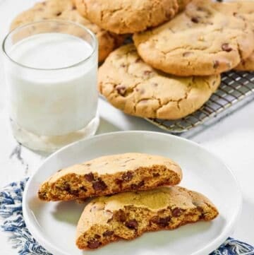 Copycat Crumble chocolate chip cookies and a glass of milk.