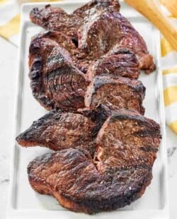 Copycat Fogo de Chao picanha steaks on a platter.