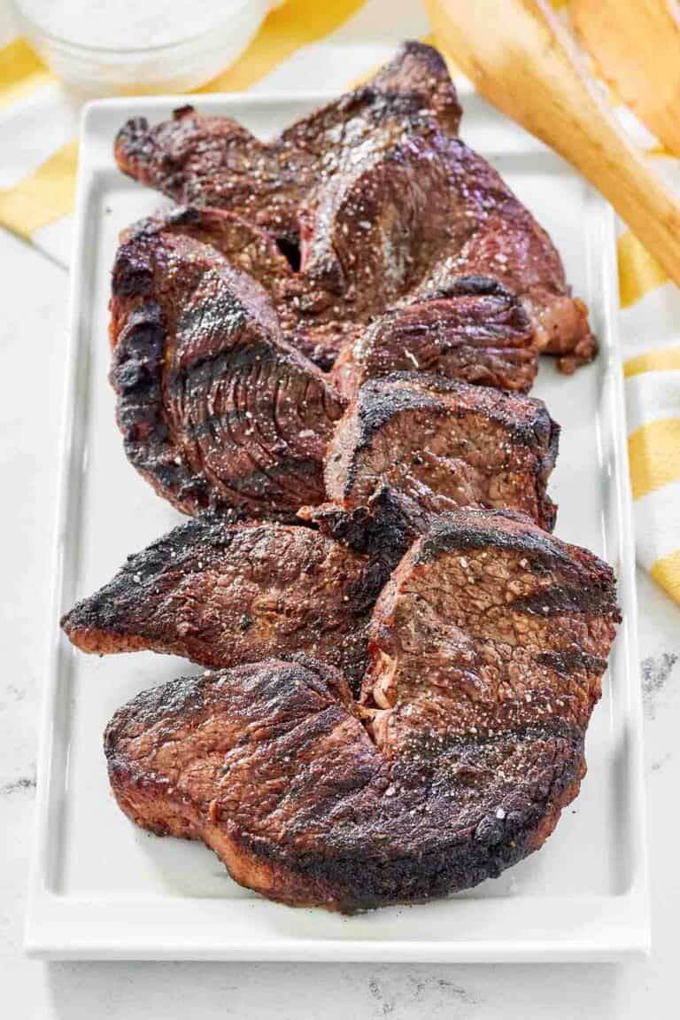 Copycat Fogo de Chao picanha steaks on a platter.