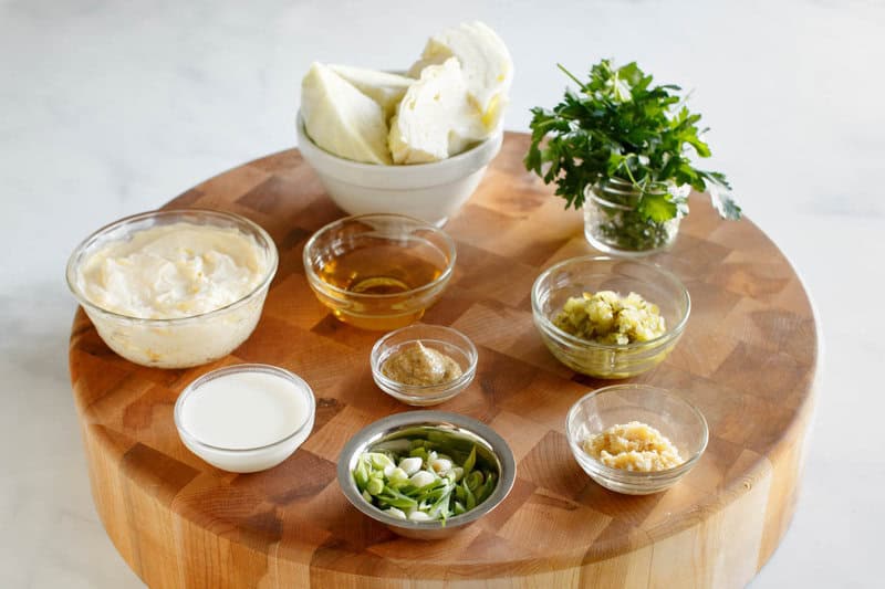 Copycat Houston's coleslaw ingredients on a wood surface.