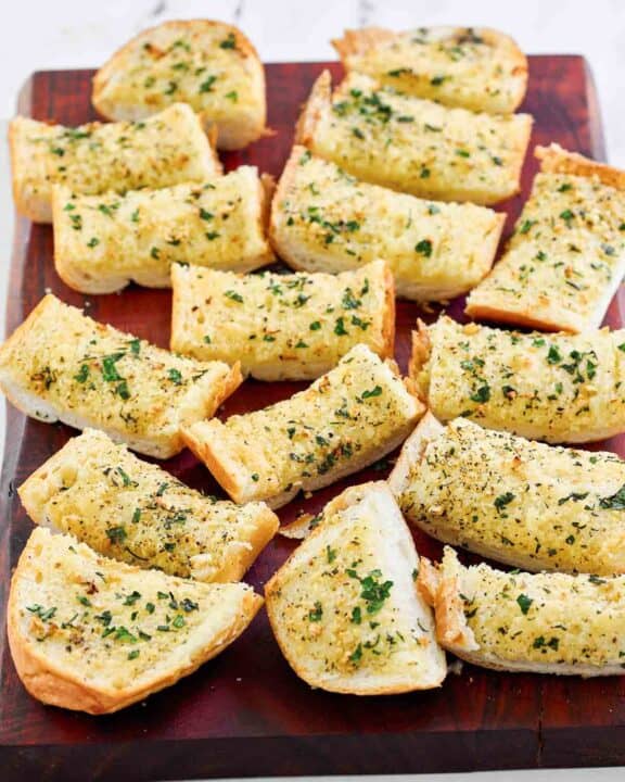 Copycat Brennan's garlic bread on a wood cutting board.