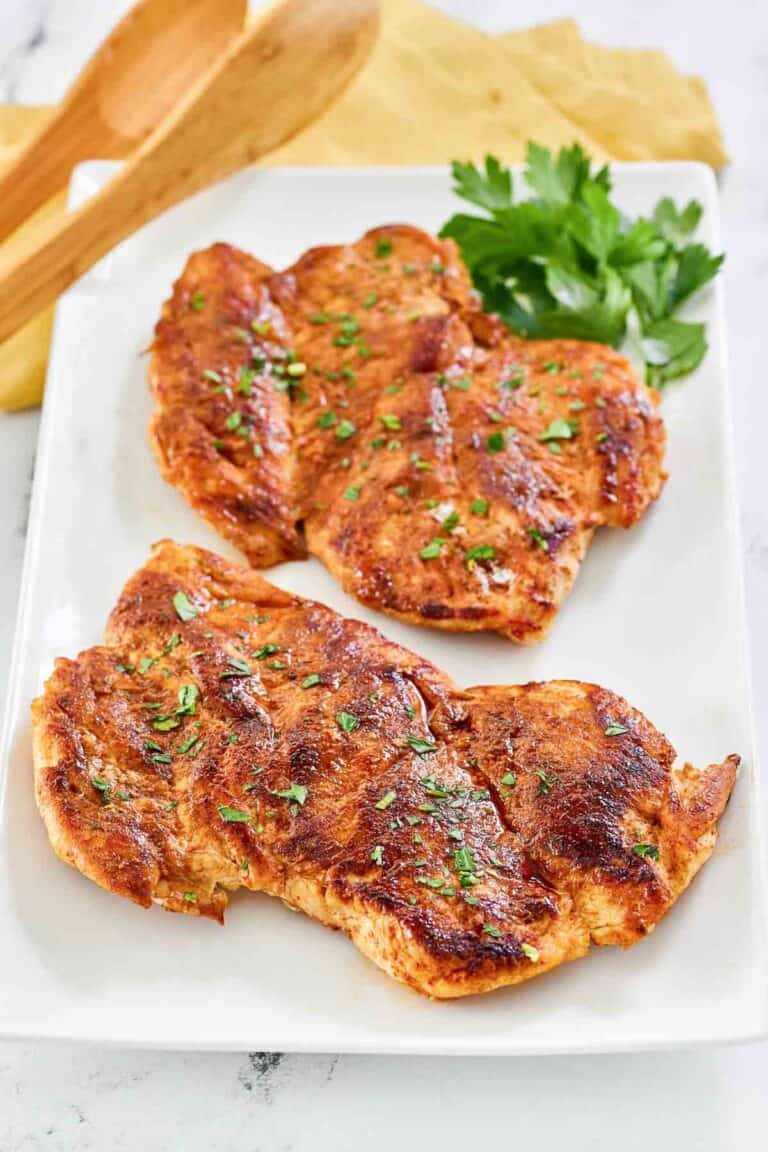 Copycat cracker barrel smoky southern chicken breasts on a platter.