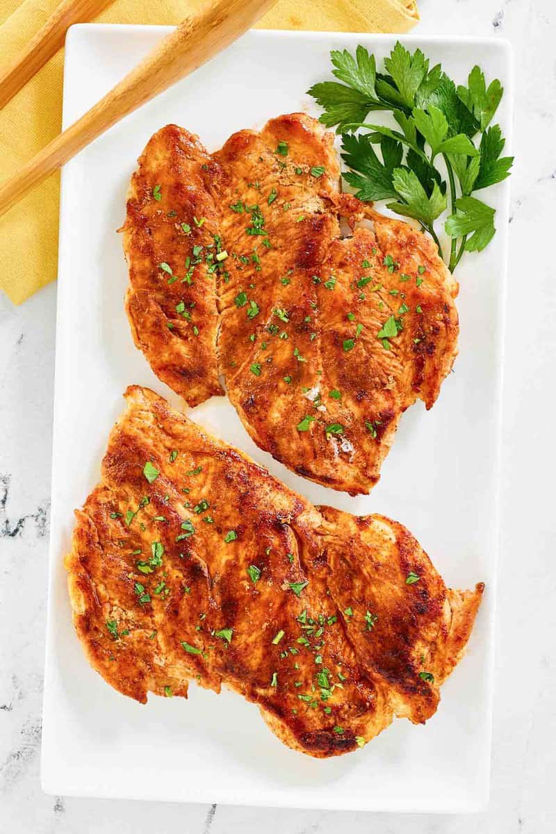 Copycat cracker barrel smoky southern grilled chicken on a platter.