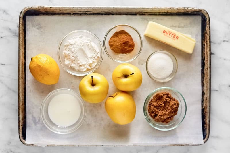 Copycat cracker barrel southern apple cobbler ingredients on a tray.