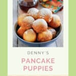 A bowl of copycat Denny's pancake puppies served with syrup.