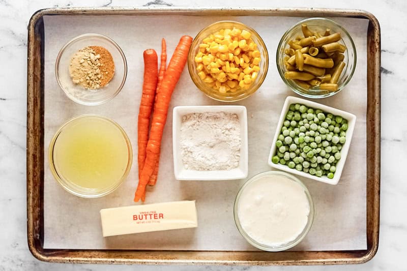 Copycat Dolly Parton Dixie Stampede creamy vegetable soup ingredients on a tray.