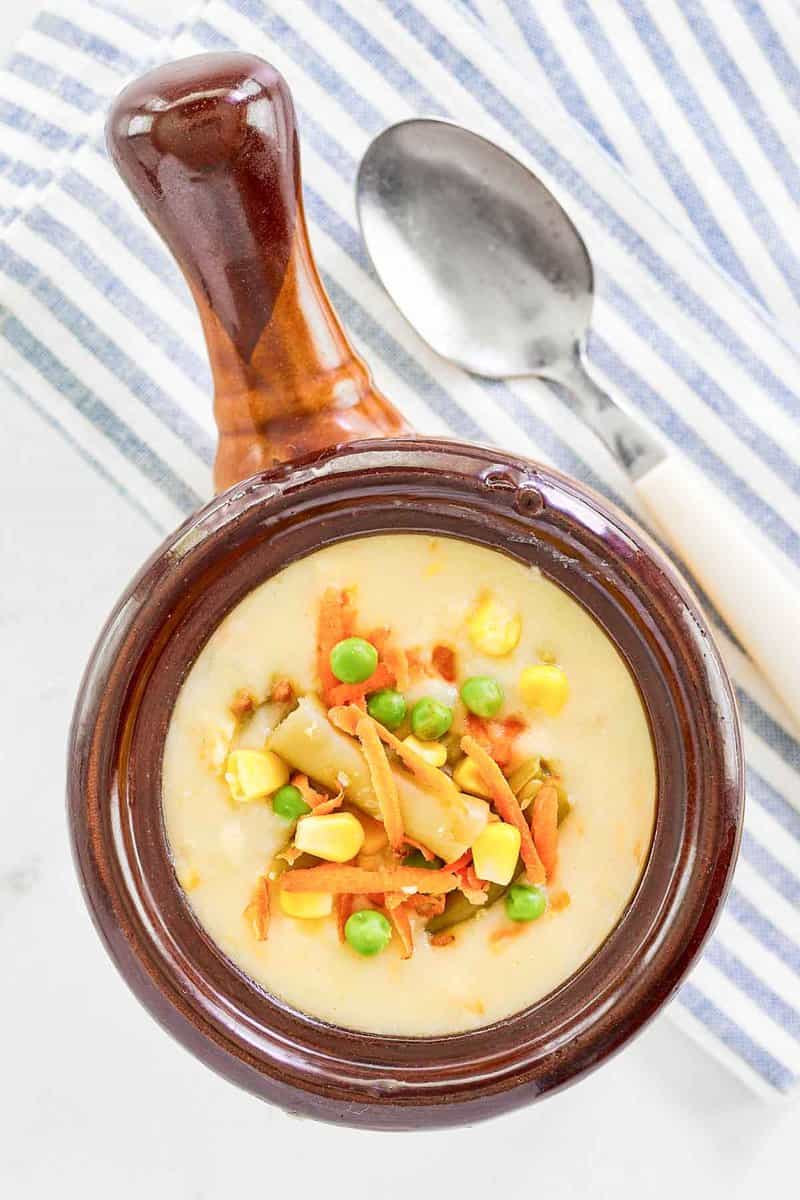 A bowl of copycat Dolly Parton Dixie Stampede creamy vegetable soup.