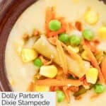 Homemade Dolly Parton Dixie Stampede vegetable soup garnished with veggies.