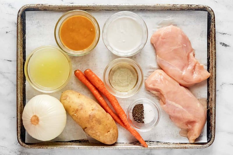 Instant Pot Thai yellow chicken curry ingredients on a tray.