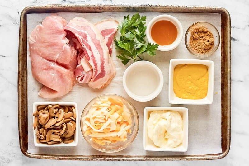 Copycat outback steakhouse alice springs chicken ingredients on a tray.