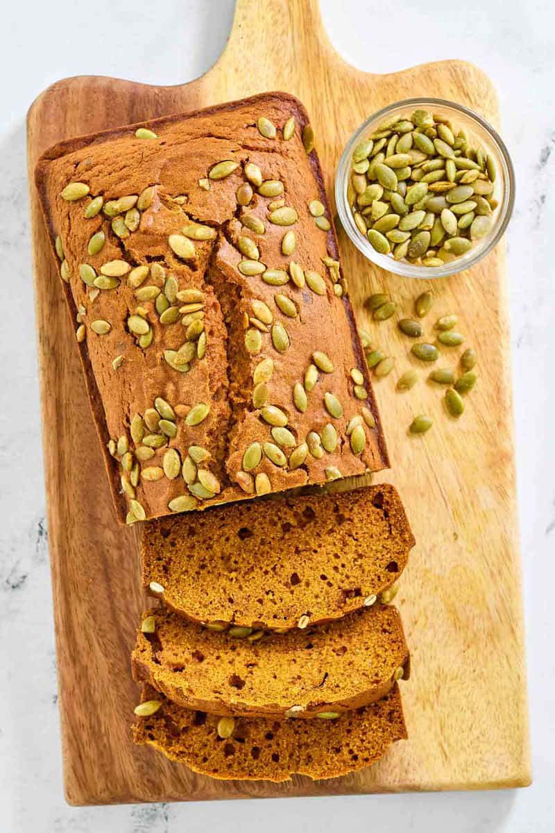 Copycat starbucks pumpkin breadstuff  connected  a wood   cutting board.