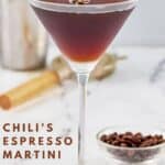 Homemade chili's espresso martini and a bowl of coffee beans.