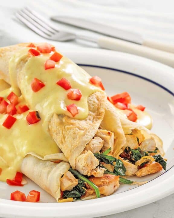 Copycat ihop chicken florentine crepes on a plate.