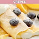 Homemade ihop lemon ricotta crepes garnished with fresh blueberries.