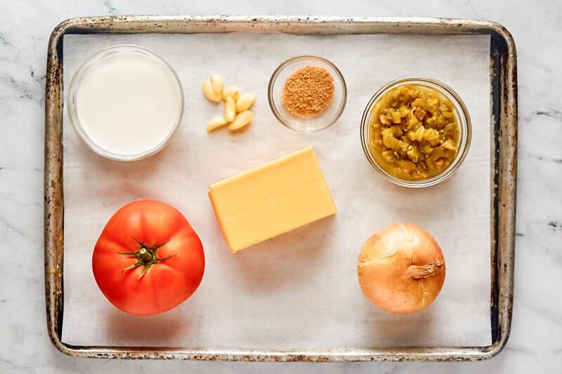 Copycat pappasito's queso dip ingredients on a tray.