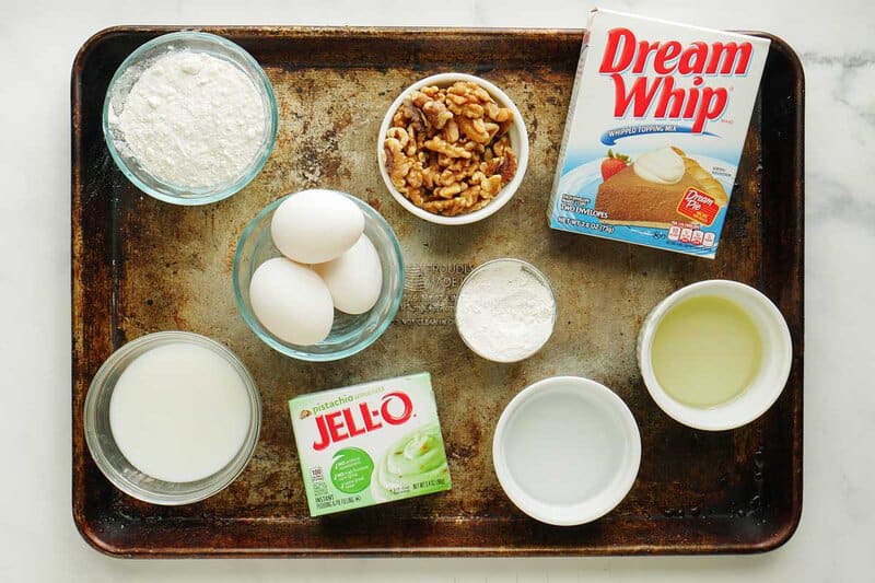 Pistachio cake ingredients on a tray.