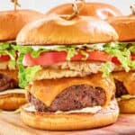 Copycat red robin banzai burger on a wood cutting board.