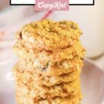 Grandma's oatmeal raisin cookies stacked on a plate.